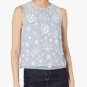 Light blue top with white sequin detail - NEW WITH TAGS